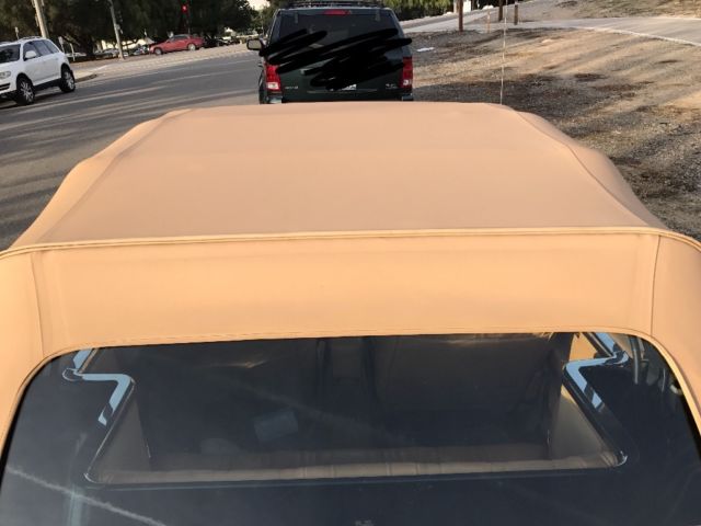 1985 Yellow Chrysler LeBaron Convertible