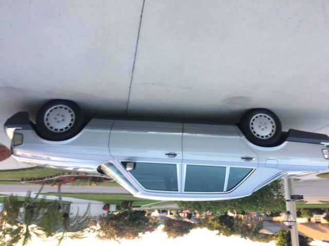 1985 Silver Mercedes-Benz 500-Series Sedan