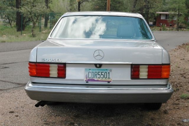 1985 Silver Mercedes-Benz 500-Series Sedan