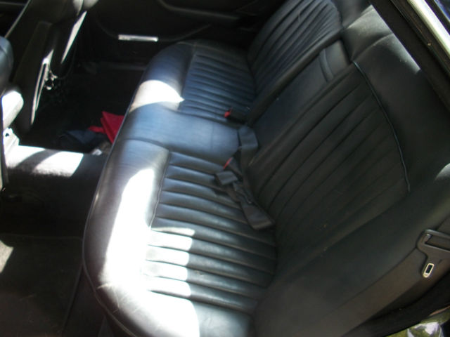 1985 Black Mercedes-Benz 500-Series Sedan