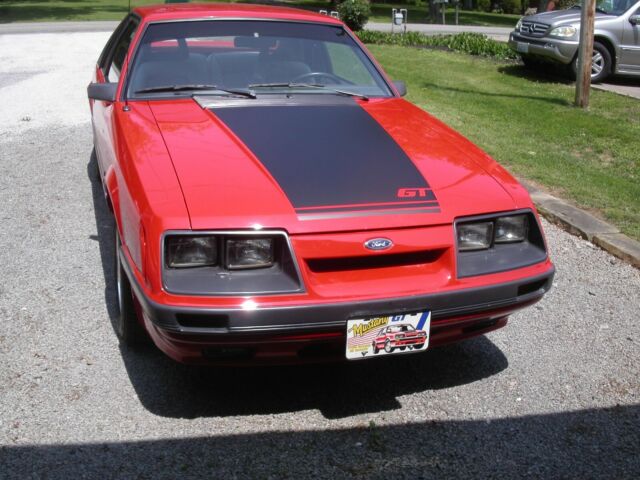 1985 Red Ford Mustang Hatchback