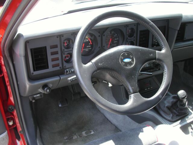 1985 Red Ford Mustang Hatchback