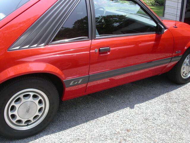 1985 Red Ford Mustang Hatchback