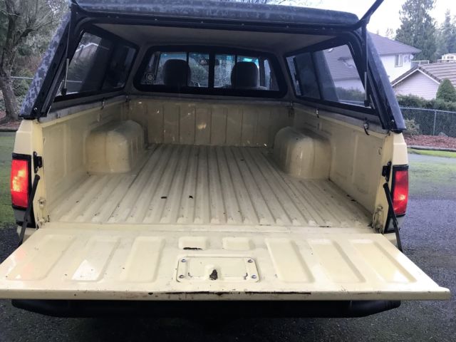 1985 yellow/custom stripe Nissan 720 Extended Cab Pickup