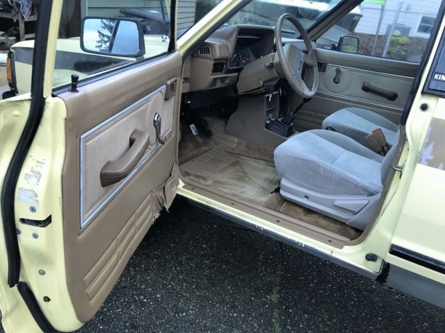 1985 yellow/custom stripe Nissan 720 Extended Cab Pickup