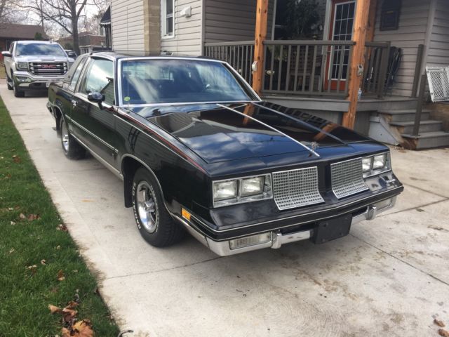 1985 Black Oldsmobile Cutlass Coupe