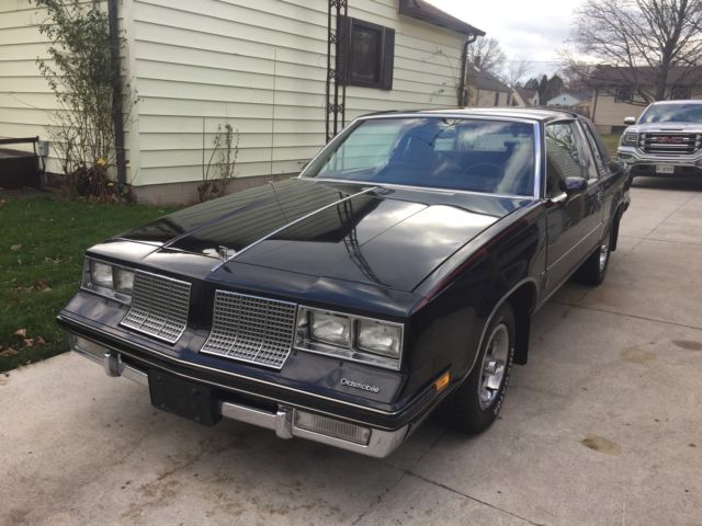 1985 Black Oldsmobile Cutlass Coupe