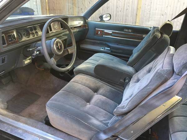 1985 Black Oldsmobile Cutlass Coupe