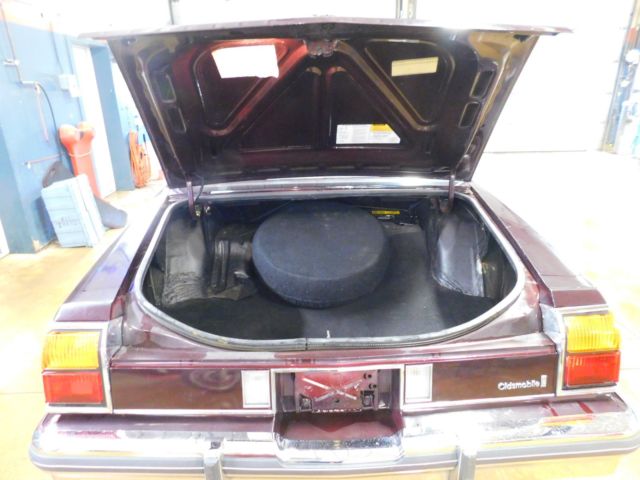 1985 Maroon Oldsmobile Eighty-Eight Sedan