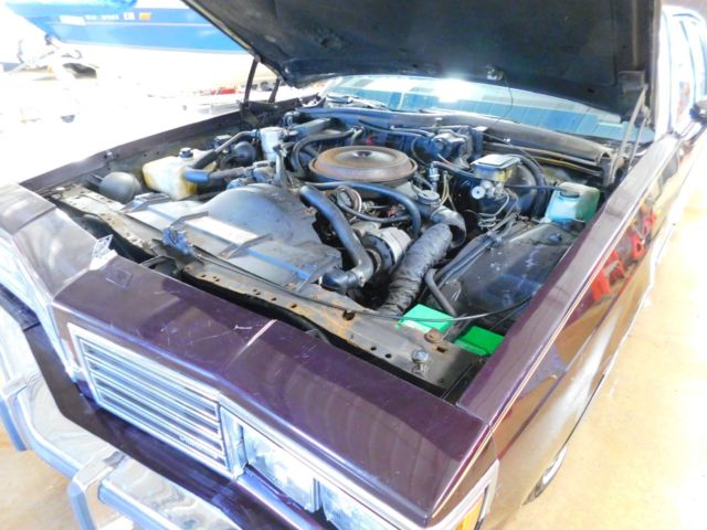 1985 Maroon Oldsmobile Eighty-Eight Sedan