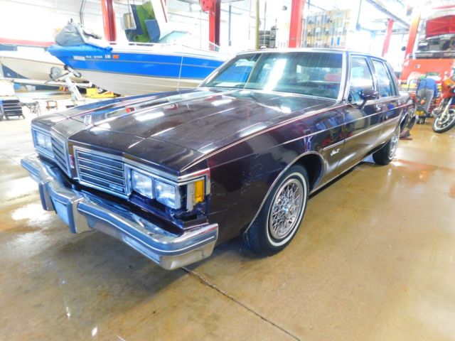 1985 Maroon Oldsmobile Eighty-Eight Sedan