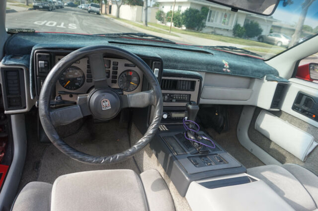 1985 Red Pontiac Fiero Coupe
