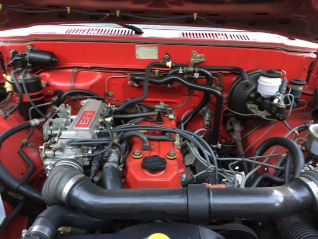 1985 Red Toyota Tacoma Extended Cab Pickup