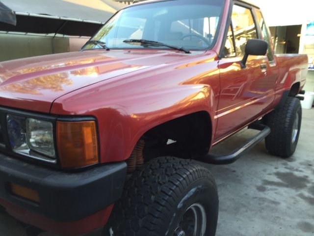 1985 Red Toyota Tacoma Extended Cab Pickup
