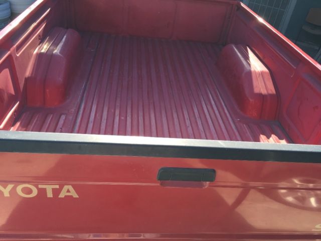 1985 Red Toyota Tacoma Extended Cab Pickup