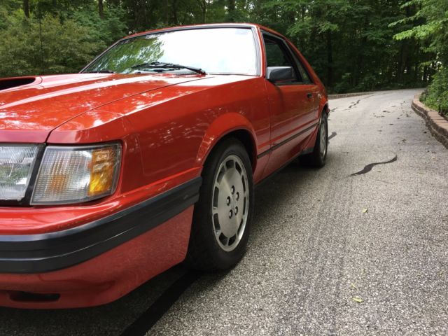 1985 Red Ford Mustang Hatchback