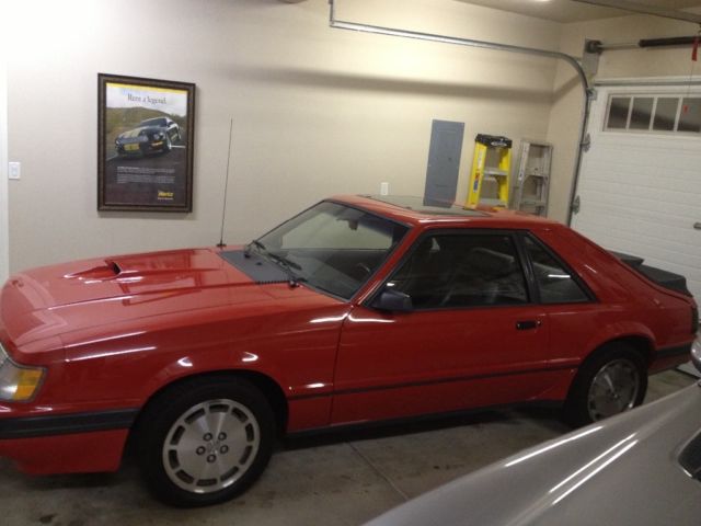 1985 Red Ford Mustang Hatchback