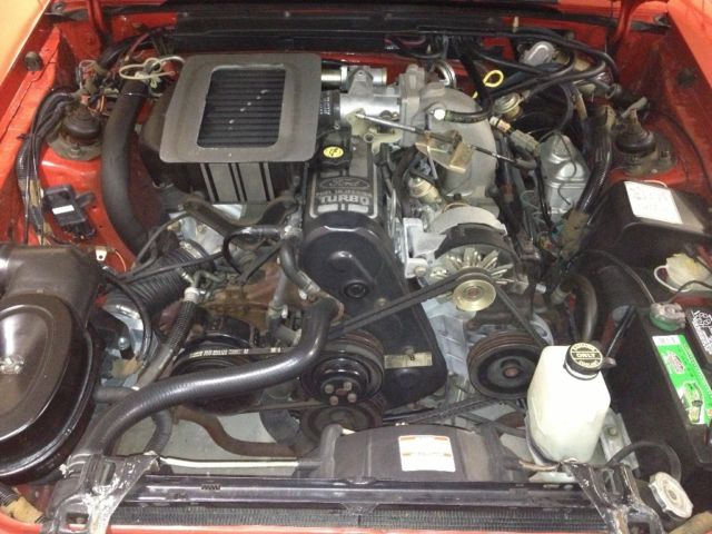1985 Red Ford Mustang Hatchback