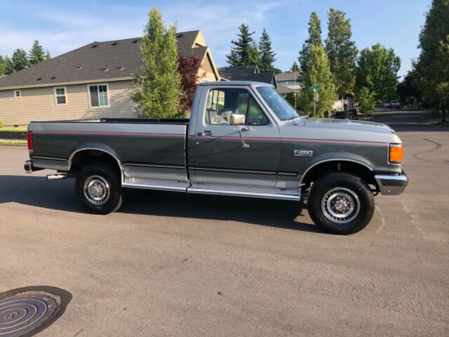1989 Silver and  Gray Ford F-250 Standard Cab Pickup