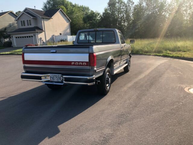 1989 Silver and  Gray Ford F-250 Standard Cab Pickup