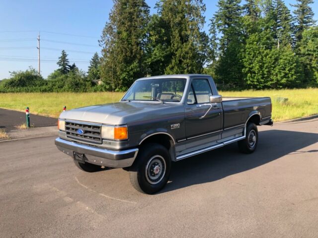 1989 Silver and  Gray Ford F-250 Standard Cab Pickup