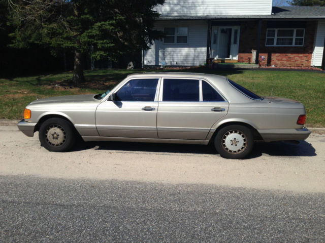 1986 Champagne Silver Mercedes-Benz 400-Series Sedan