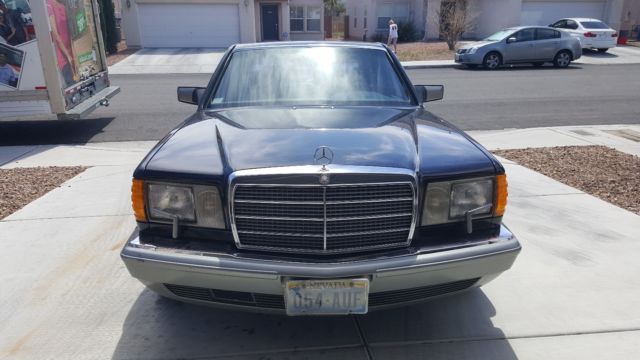 1986 Black Mercedes-Benz 500-Series Sedan