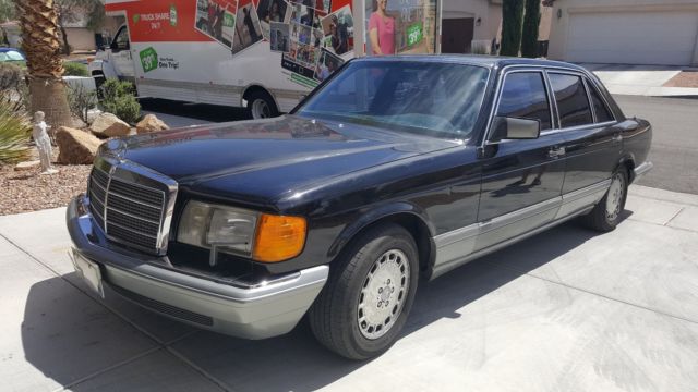 1986 Black Mercedes-Benz 500-Series Sedan