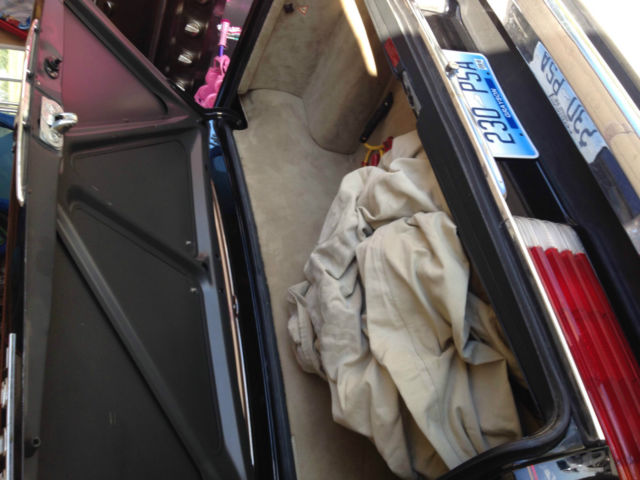 1986 Black Mercedes-Benz 500-Series Convertible