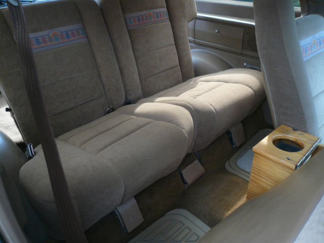 1986 Blue and Tan Ford Bronco II SUV