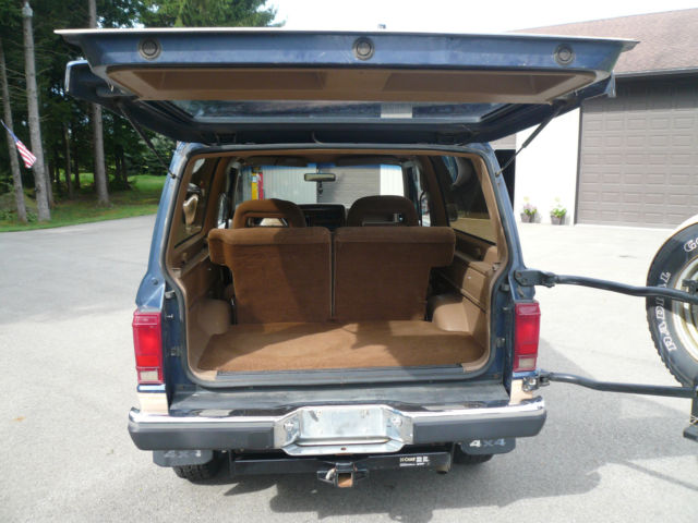 1986 Blue and Tan Ford Bronco II SUV