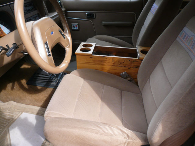 1986 Blue and Tan Ford Bronco II SUV