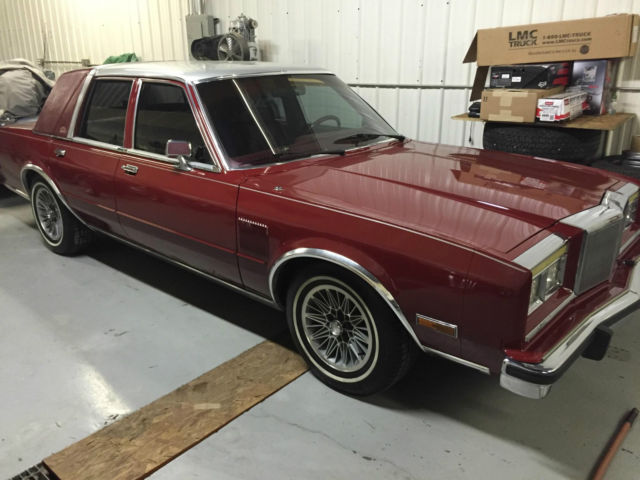 1986 Red Chrysler New Yorker 4 door