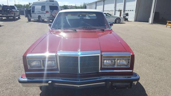 1986 Red Chrysler New Yorker 4 door