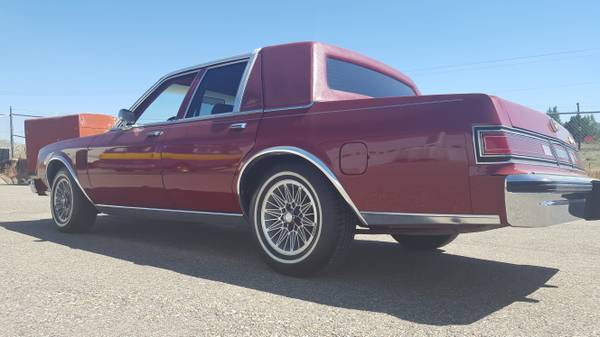 1986 Red Chrysler New Yorker 4 door