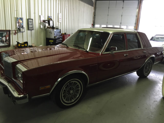 1986 Red Chrysler New Yorker 4 door