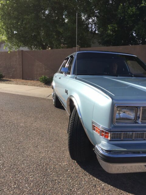 1986 Light blue Chrysler Other Sedan