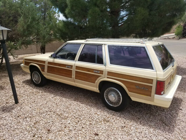 1986 Yellow Chrysler Town & Country Wagon