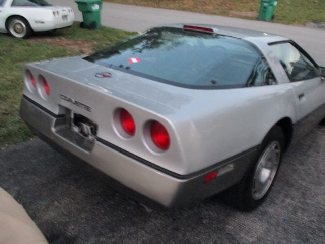 1986 silver Chevrolet Corvette