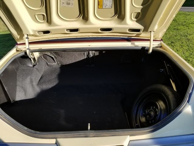 1986 Yellow Oldsmobile Cutlass Coupe