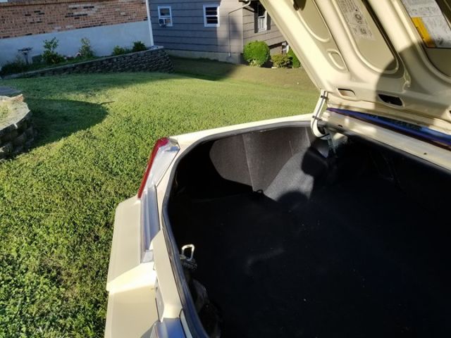 1986 Yellow Oldsmobile Cutlass Coupe