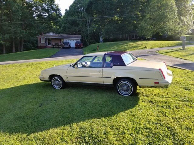 1986 Yellow Oldsmobile Cutlass Coupe