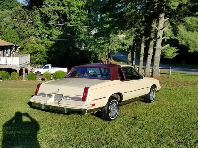 1986 Yellow Oldsmobile Cutlass Coupe