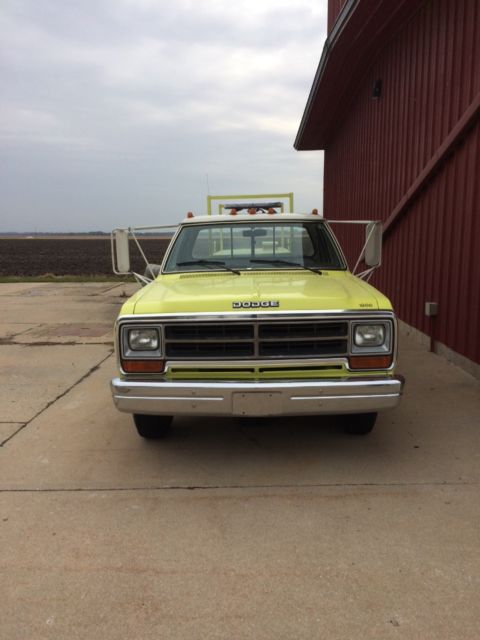 1986 Yellow and White Dodge Ram 3500 Cab and attached water tank on back
