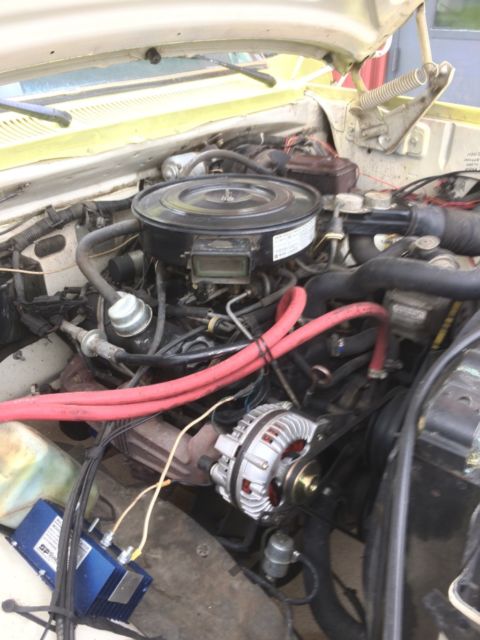 1986 Yellow and White Dodge Ram 3500 Cab and attached water tank on back