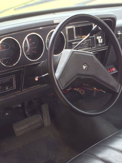 1986 Yellow and White Dodge Ram 3500 Cab and attached water tank on back