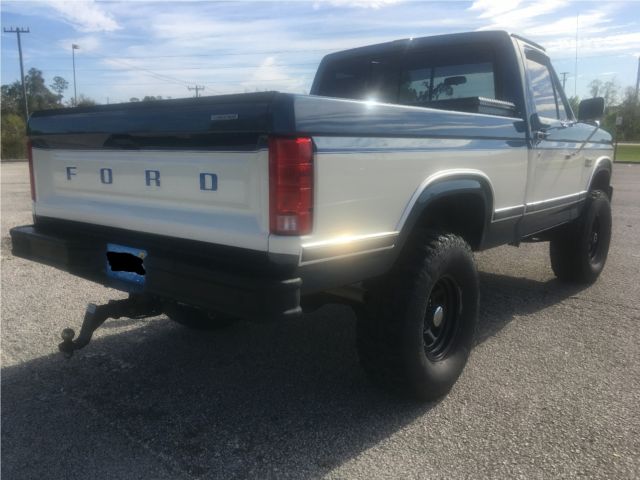 1986 Two Tone Blue and White Ford F-150 Pickup Truck