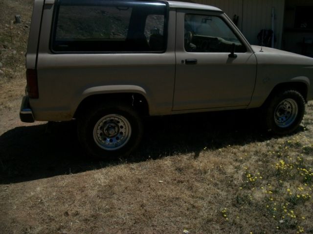 1986 tan Ford Bronco II
