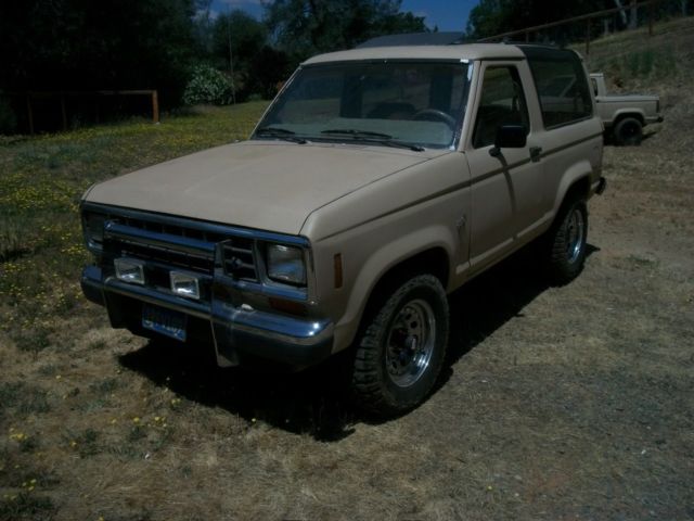 1986 tan Ford Bronco II
