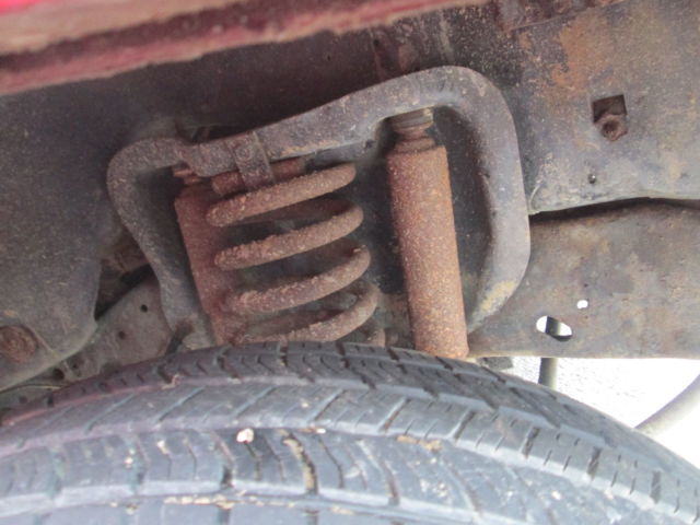 1986 Red Ford F-150 Flare Side Pickup